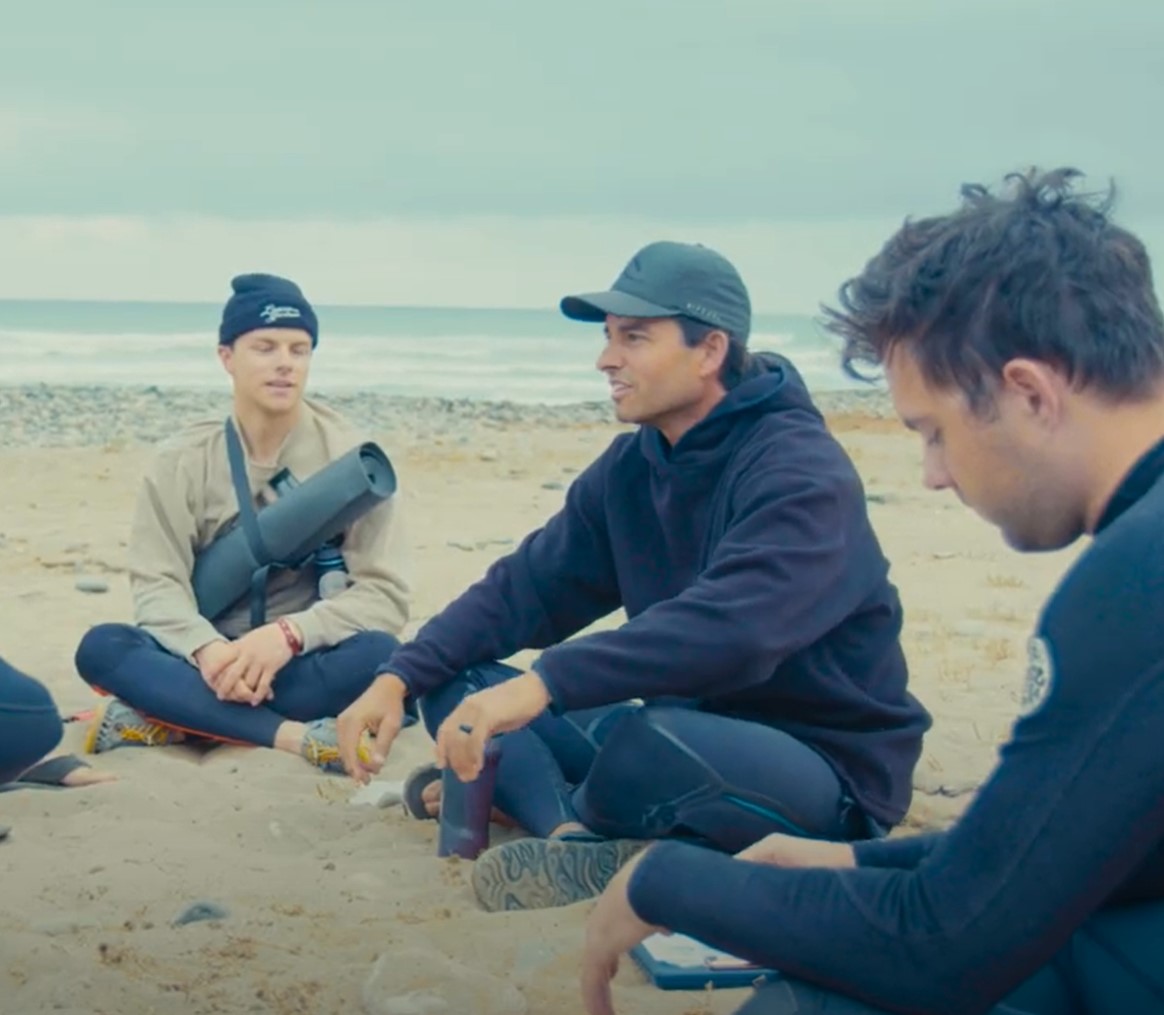 men hanging out on beach2