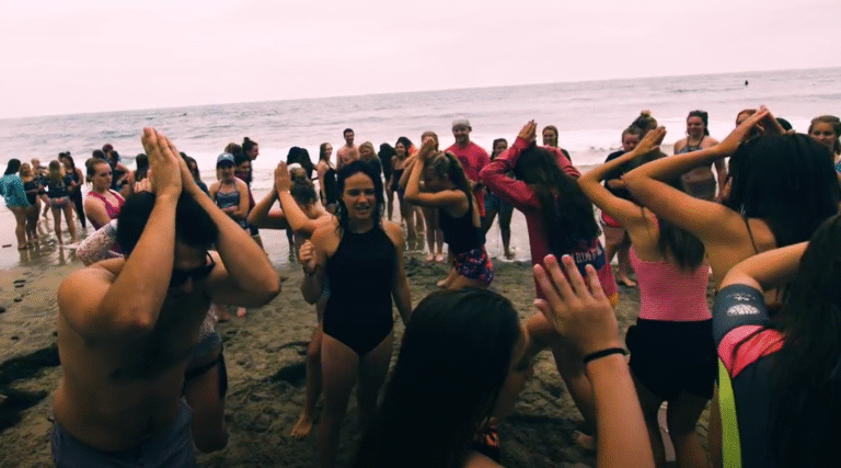 girls team chant on beach